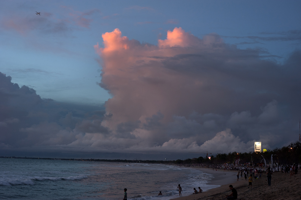 View of a Kuta beach at sunset. Kuta is a famous touristic attraction on Bali