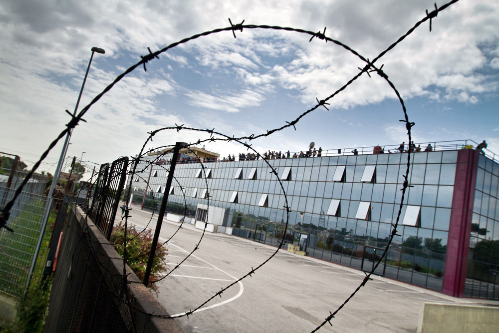 1- The Hotel is surrounded by barbed wire and barricades built by new tenants